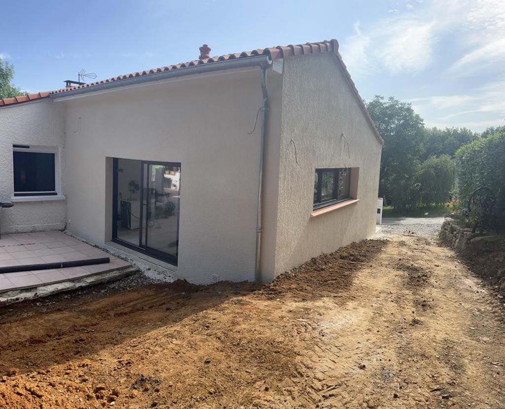 Finition en enduit taloché pour une façade élégante